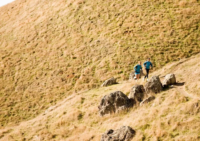 Kami Semick and Nikki Kimball training in the Marin Headlands, demonstrating the Resilient Runner strength program
